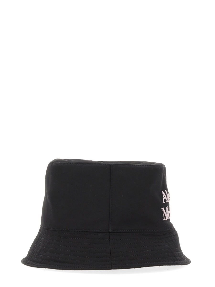 Black bucket hat with white text on a white background
