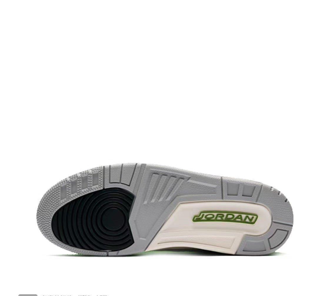 Close-up of a Air Jordan 3 Retro 'Chlorophyll' Jordan sneaker sole on a white background