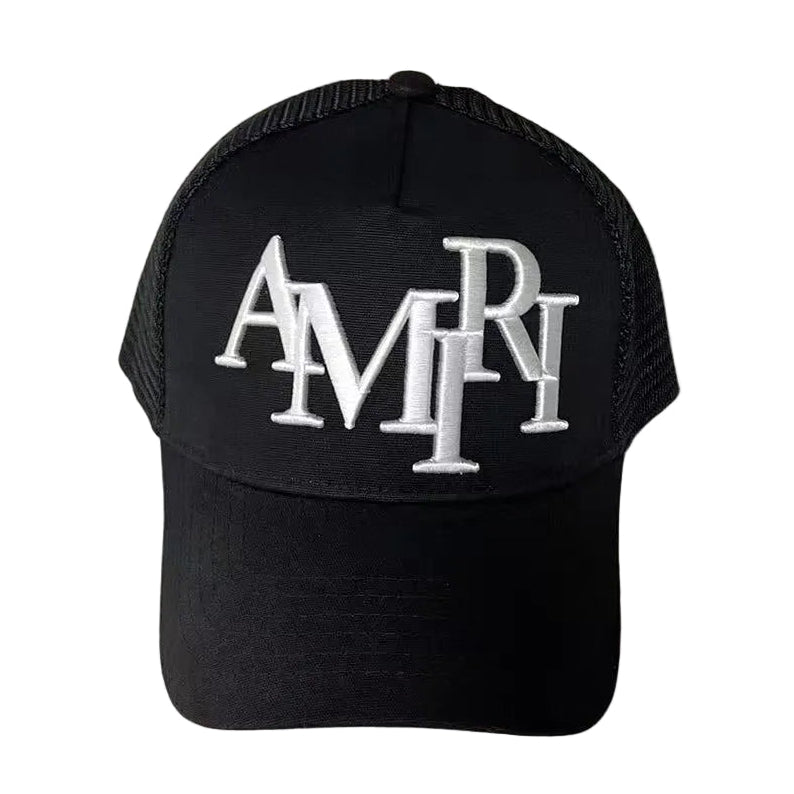 Black Amiri cap with white Amiri logo on a light gray background