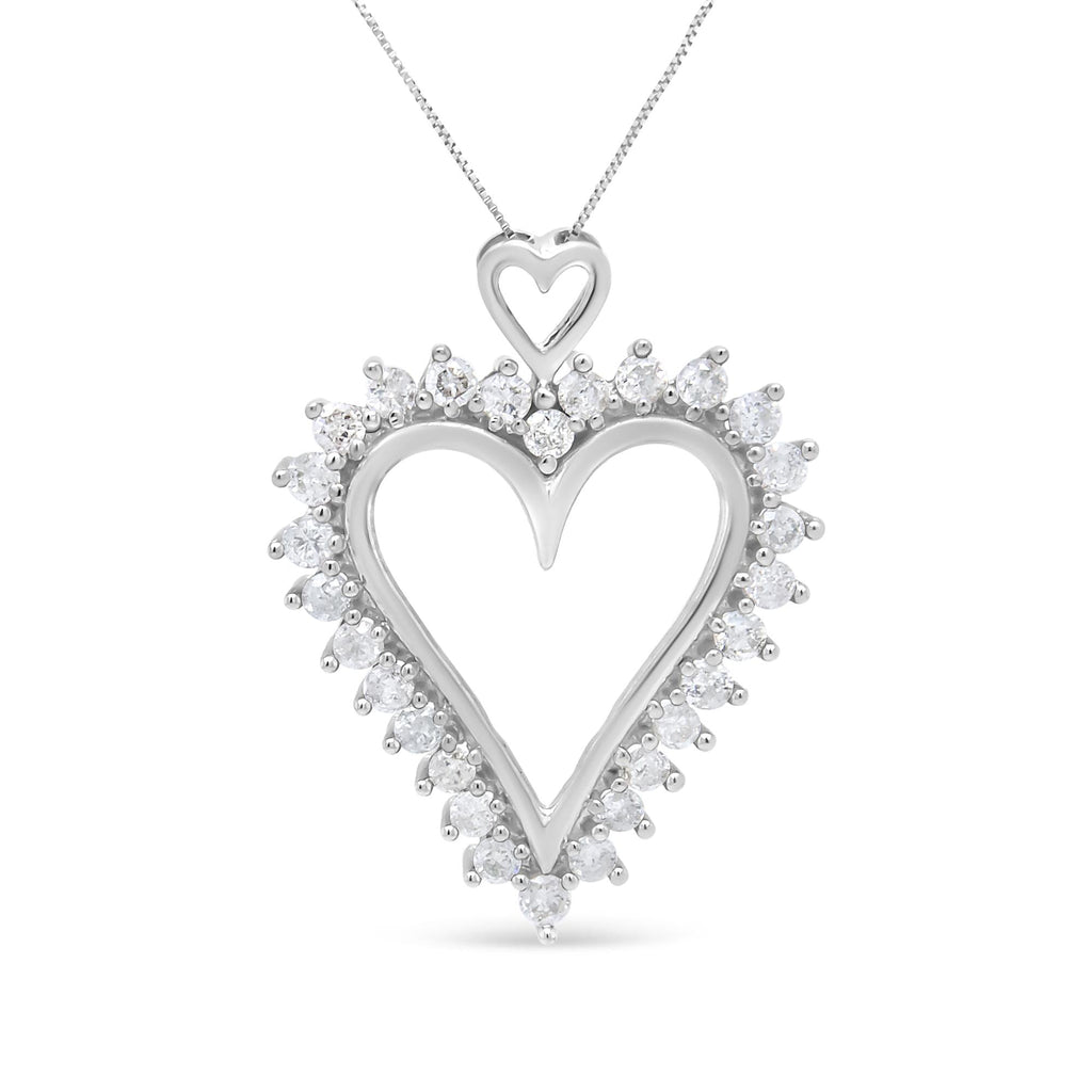 Heart-shaped diamond pendant on a white background