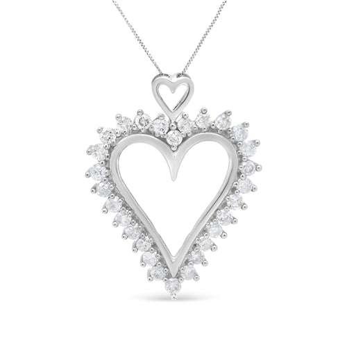 Heart-shaped diamond pendant on a white background