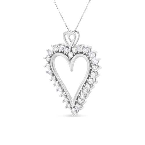 Heart-shaped diamond pendant on a white background