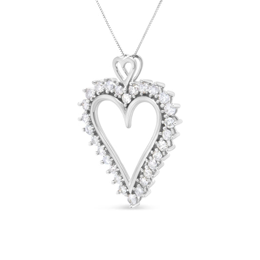 Heart-shaped diamond pendant on a white background