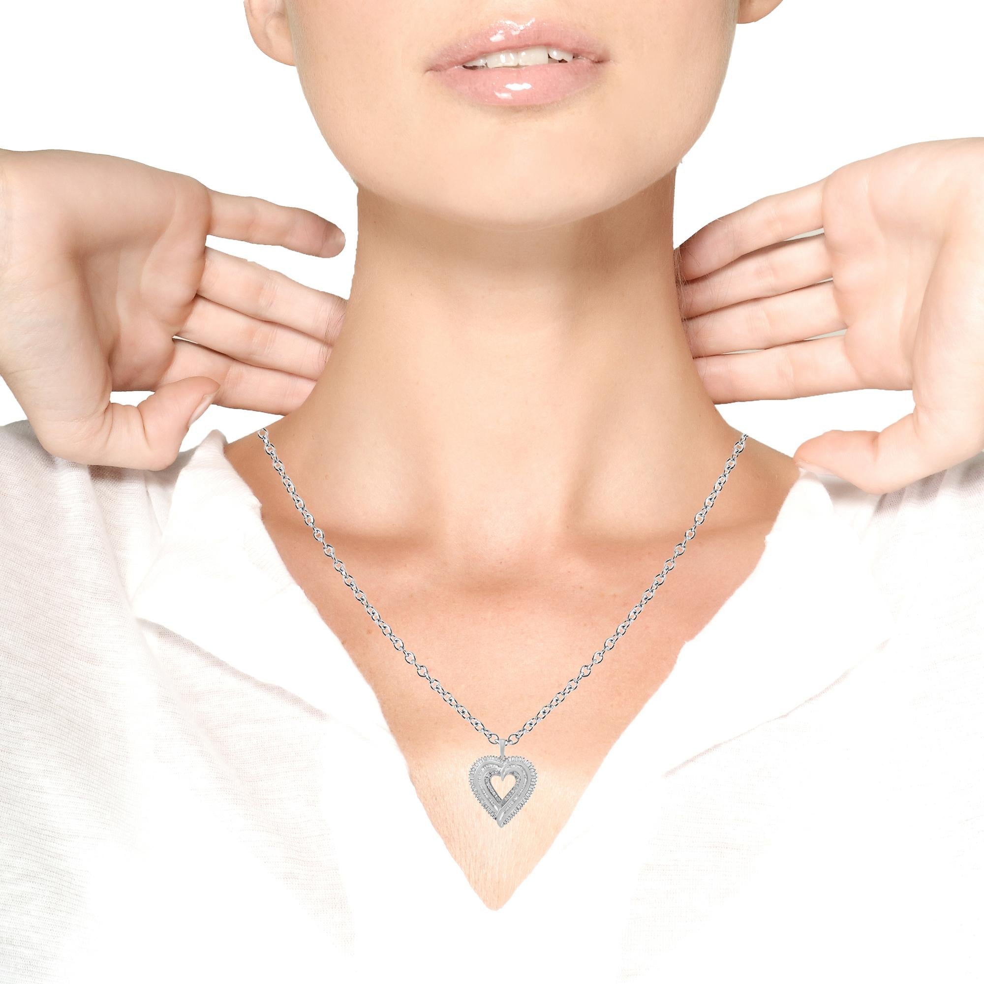 Necklace with a cross pendant worn by a person on a white background