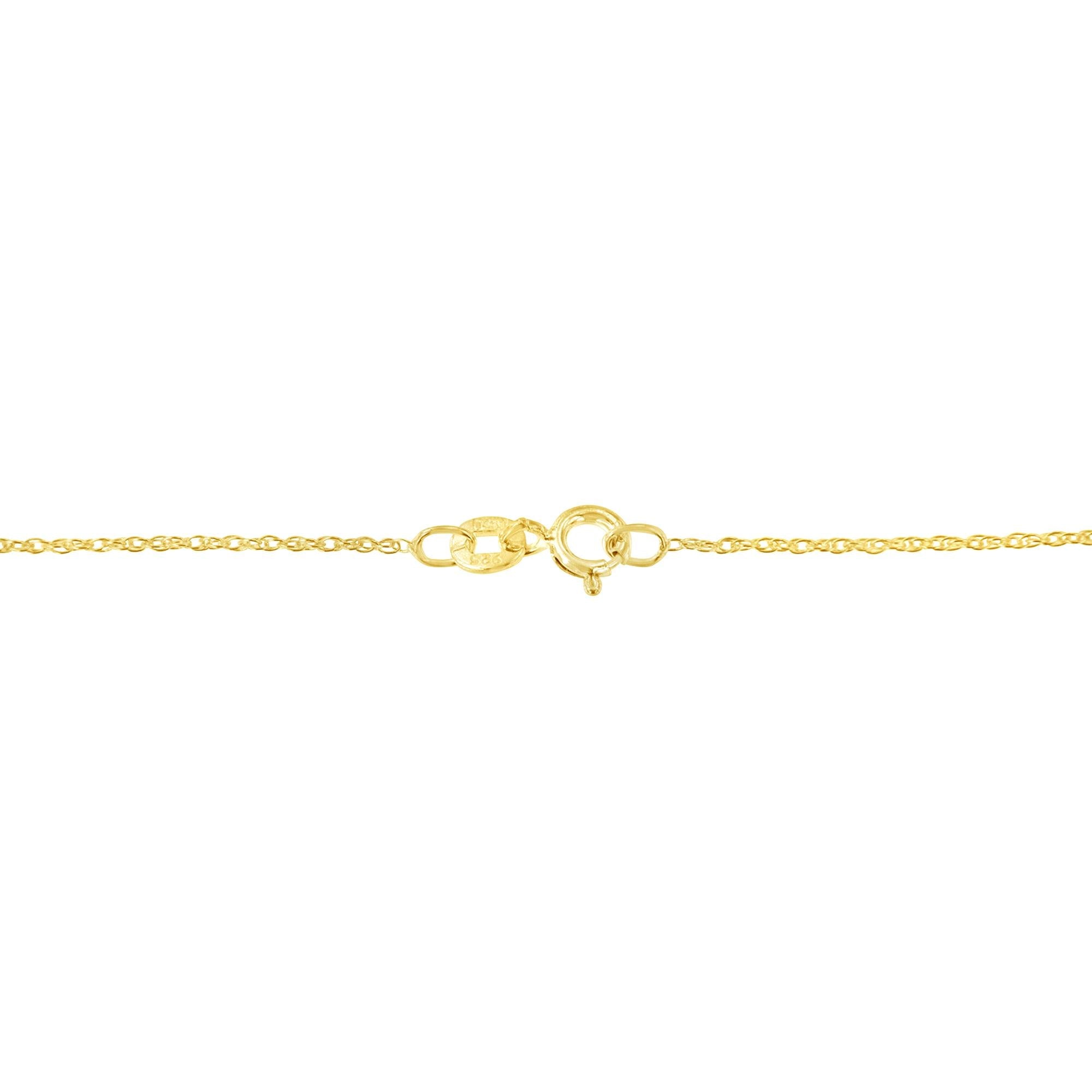 Gold chain necklace on a white background