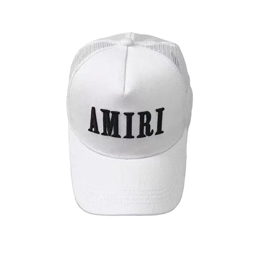 White cap with 'AMIRI' logo on a light gray background