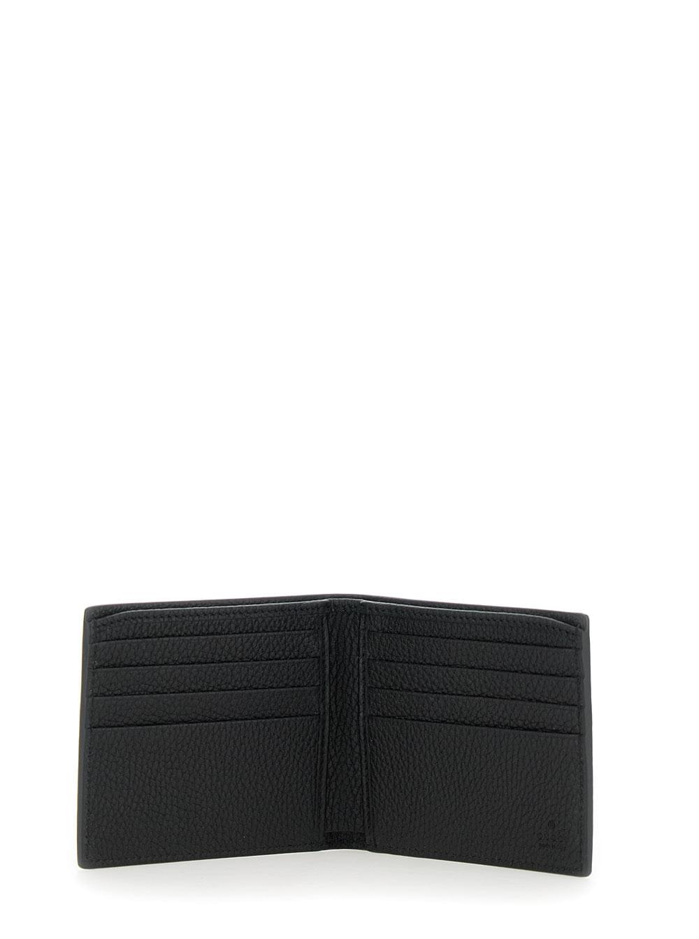 Gucci Men Black Bi-Fold Wallet With Embossed Logo Lettering On The Front In Grained Leather Man