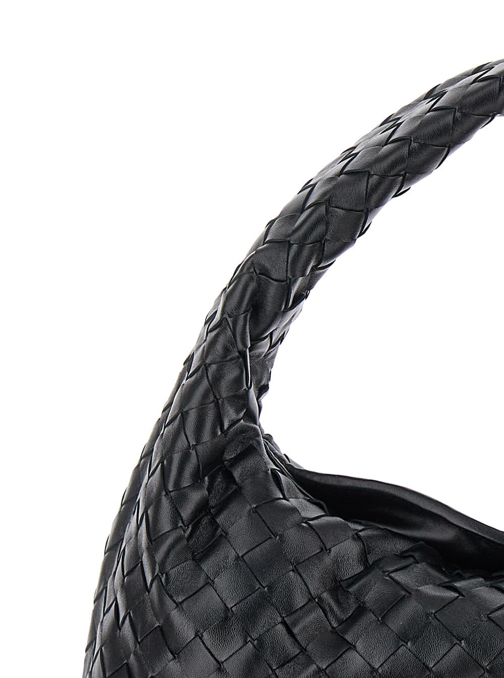 Bottega Veneta Hop Piccola shoulder bag in black leather featuring the signature intreccio motif, fixed top handle, gold-tone hardware, and magnetic closure.