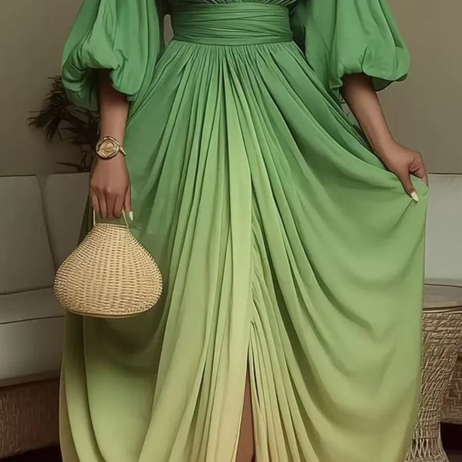 Person wearing a green dress holding a woven handbag indoors.