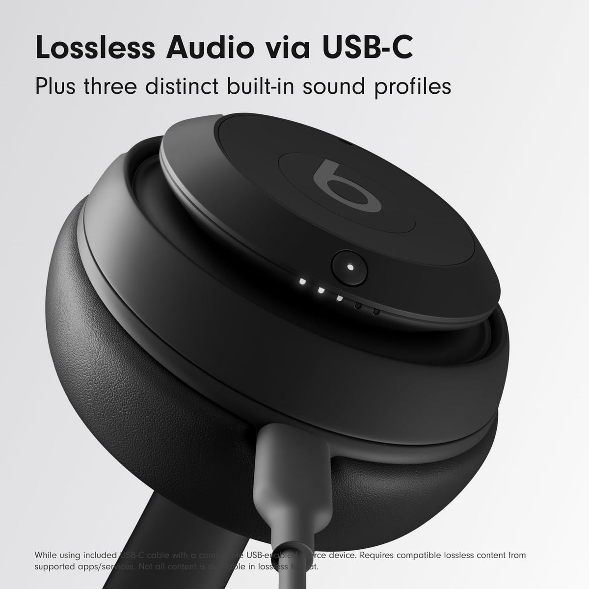 Black Beats headphones with USB-C connection on a light gray background. Beats Studio Pro Premium Wireless Over-Ear Headphones- Up to 40-Hour Battery Life, Active Noise Cancelling, Great for Travel & Commuting, USB-C Lossless Audio, Apple & Android Compatible -Black (Refurbished)
