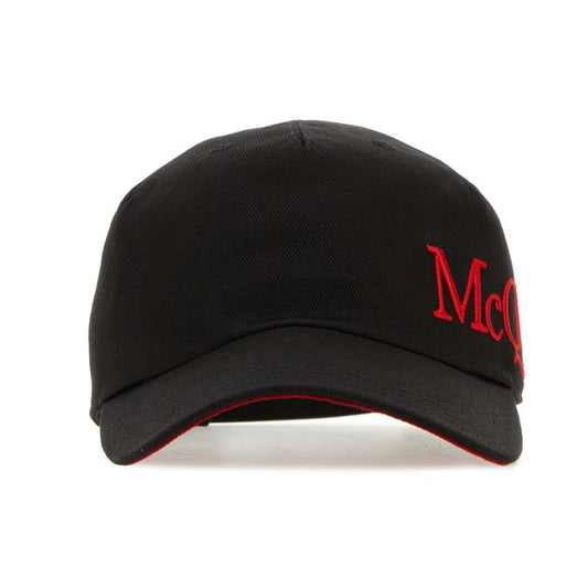Black cap with red text on a white background