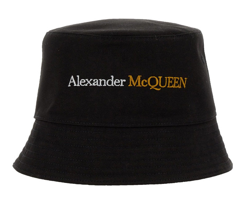 Black bucket hat with 'Alexander McQueen' logo on a white background
