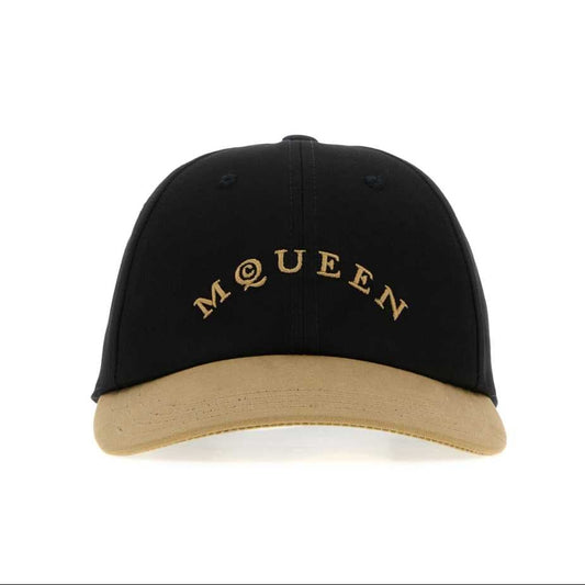 Black cap with 'Mécèen' embroidery on a white background