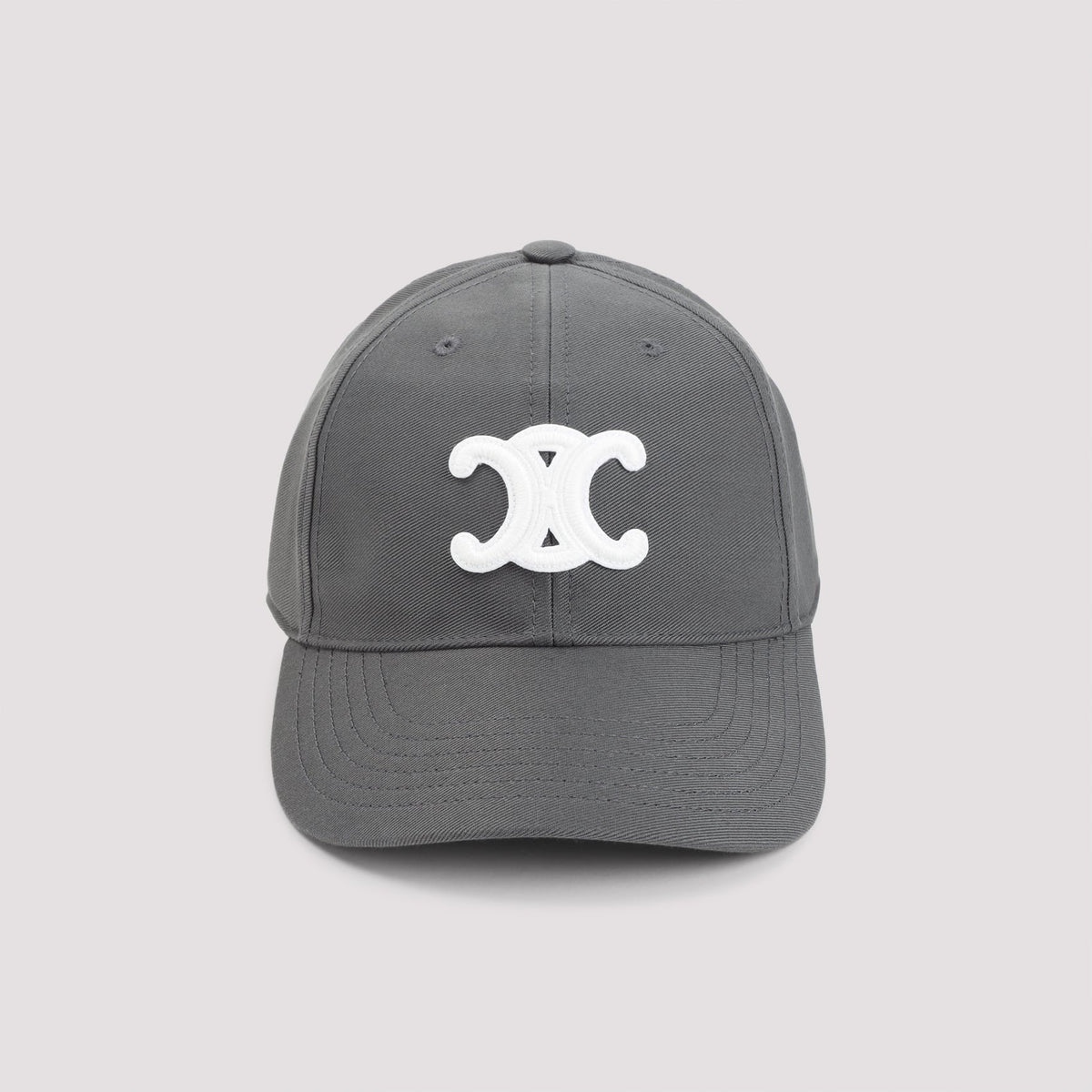 Gray cap with a white logo on a light gray background