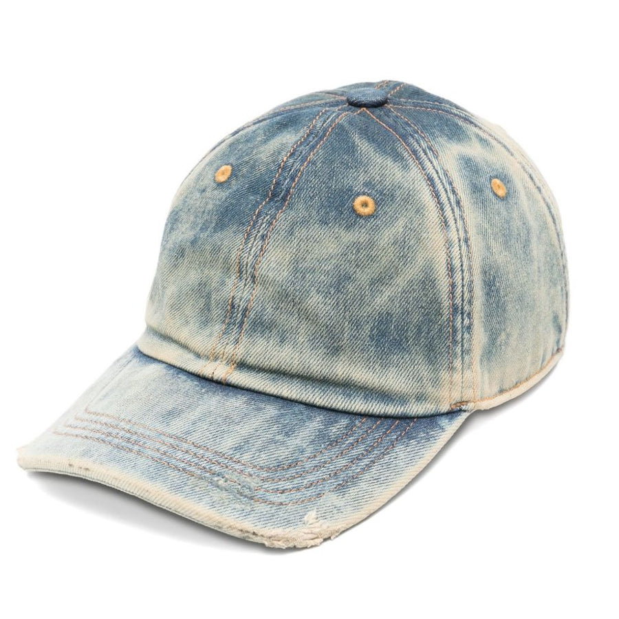 Blue denim cap on a white background
