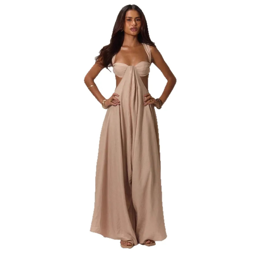 Woman wearing a beige strapless gown on a white background