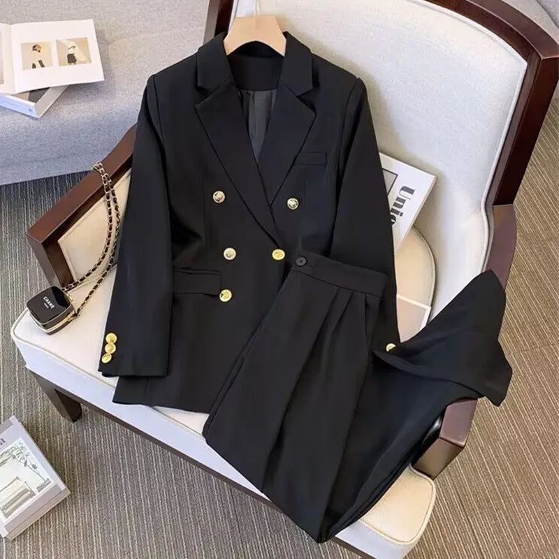Black blazer with gold buttons on a chair