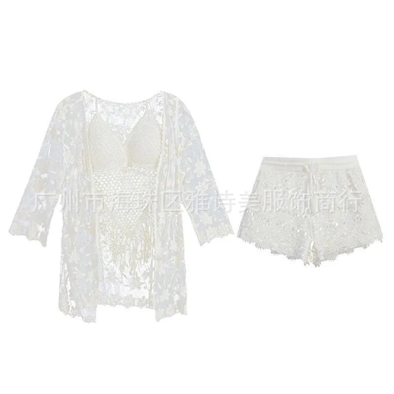 White lace top and shorts set on a white background