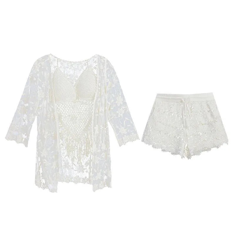 White lace top and shorts set on a white background