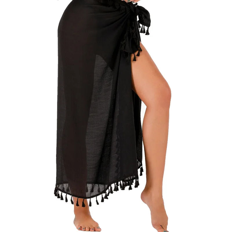 Black sarong with tassels on a white background