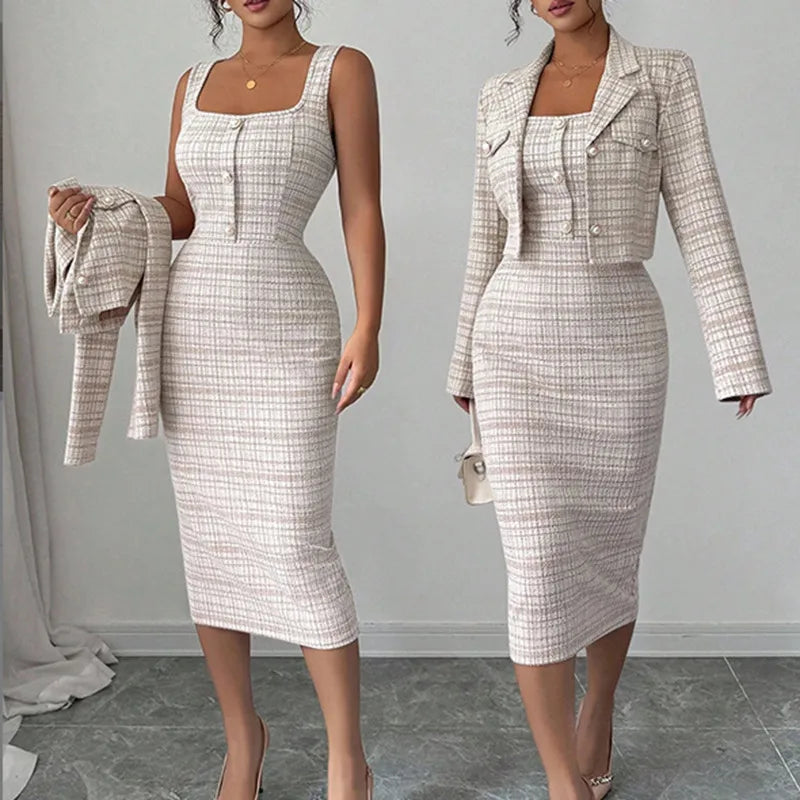 Two women modeling a plaid dress and matching suit against a gray background.