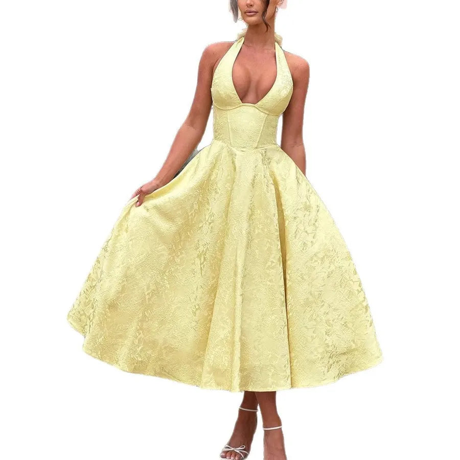 Yellow lace dress on a white background