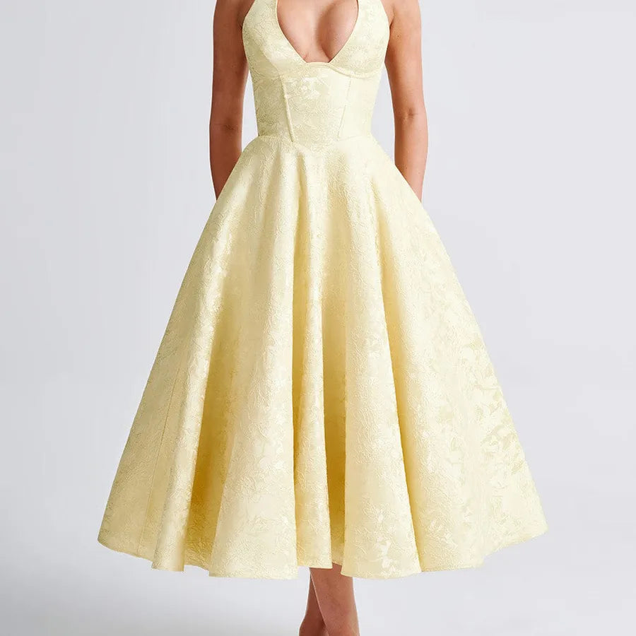 Yellow dress on a plain background