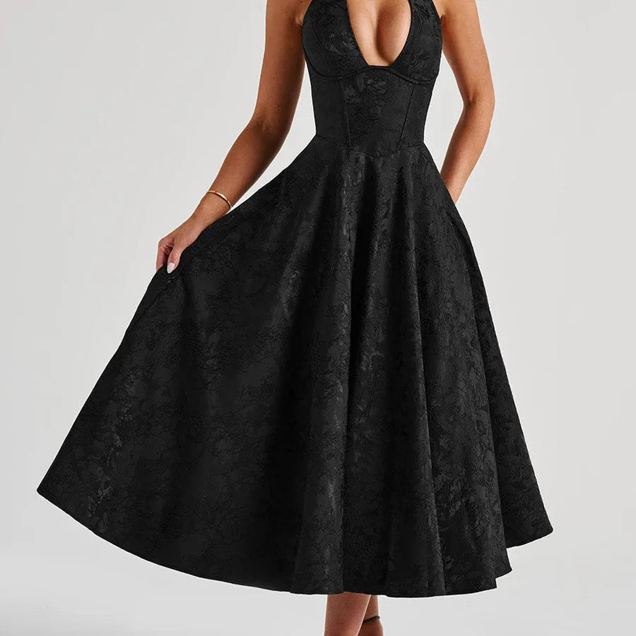 Black lace dress on a plain background