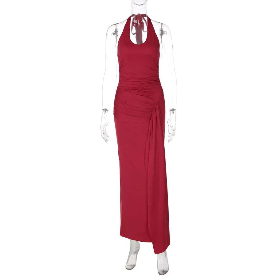 Red halter neck gown on a mannequin against a white background