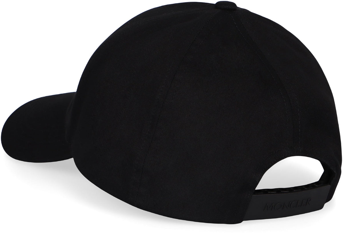 Black baseball cap on a white background