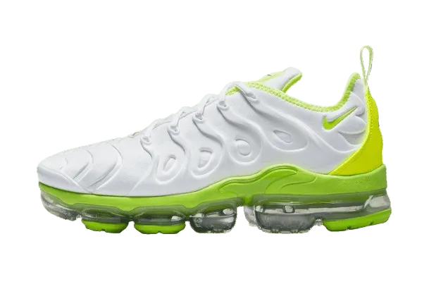 White and green Nike sneaker with transparent sole on a dark gray background