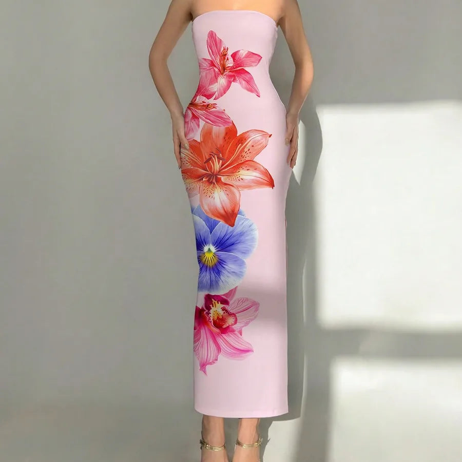 Woman wearing a strapless dress with floral design against a neutral background. Vacation resort dress