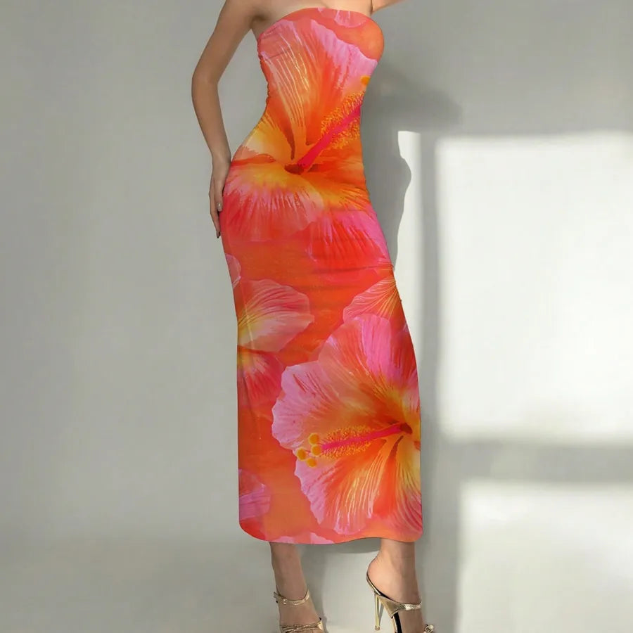 Woman wearing a strapless dress with floral pattern against a neutral background. Vacation resort dress