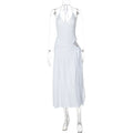 White dress on a mannequin against a white background halter skirt set, two piece outfit women, skirt co ord set, matching set women, bodycon skirt set, sexy vacation outfit, halter neck outfit, asymmetrical outfit, date night outfit, clubwear women, birthday outfit women, resort wear women, vacation clothes women, slim fit skirt set, elegant two piece set, womens co ord set, sexy matching set, summer outfit women, luxury fashion women, trendy two piece outfit swimsuit