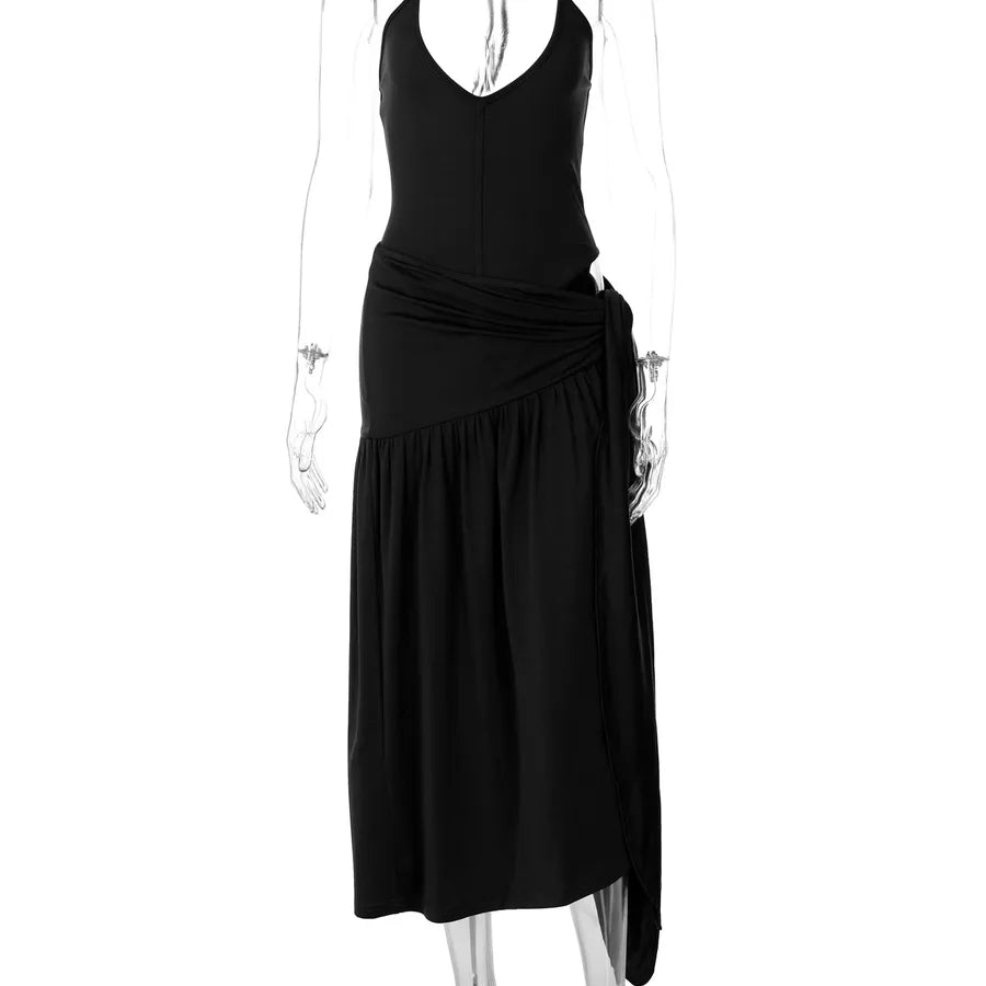 Black dress on a mannequin against a white background halter skirt set, two piece outfit women, skirt co ord set, matching set women, bodycon skirt set, sexy vacation outfit, halter neck outfit, asymmetrical outfit, date night outfit, clubwear women, birthday outfit women, resort wear women, vacation clothes women, slim fit skirt set, elegant two piece set, womens co ord set, sexy matching set, summer outfit women, luxury fashion women, trendy two piece outfit swimsuit