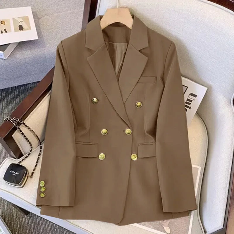 Brown blazer with gold buttons on a hanger