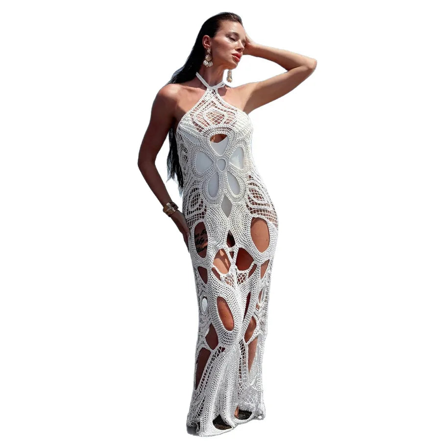 Woman wearing a white crochet dress on a white background