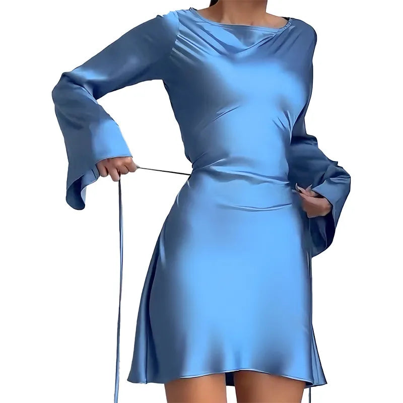 Blue satin dress with long sleeves on a white background