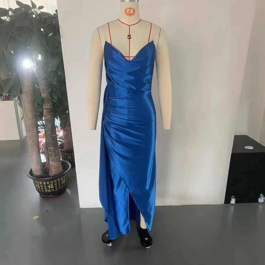 Blue satin dress on a mannequin against a plain background