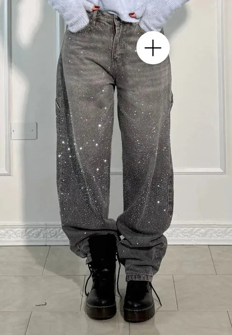 Person wearing gray glittery pants with a white background rhinestone jeans women, sparkly jeans, crystal jeans, bling denim pants, embellished jeans, high waisted jeans women, star jeans, rhinestone denim, designer inspired jeans, glam jeans, streetwear jeans women, trendy denim pants, fashion jeans women, statement jeans, luxury denim, straight leg jeans, commuter style fashion, women's denim pants, sparkle jeans, casual glam outfit