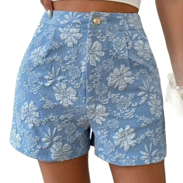 Blue floral shorts on a white background high waisted shorts women, jacquard shorts, vintage shorts women, boho shorts, summer shorts women, boutique shorts, woven shorts women, resort wear women, vacation outfit women, chic summer shorts, elegant shorts women, festival outfit women, high rise shorts, trendy summer fashion, casual chic outfit, bohemian shorts, statement shorts women, women's fashion shorts, luxury summer style, boutique clothing women