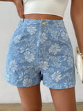Blue floral shorts worn by a person on a white background high waisted shorts women, jacquard shorts, vintage shorts women, boho shorts, summer shorts women, boutique shorts, woven shorts women, resort wear women, vacation outfit women, chic summer shorts, elegant shorts women, festival outfit women, high rise shorts, trendy summer fashion, casual chic outfit, bohemian shorts, statement shorts women, women's fashion shorts, luxury summer style, boutique clothing women
