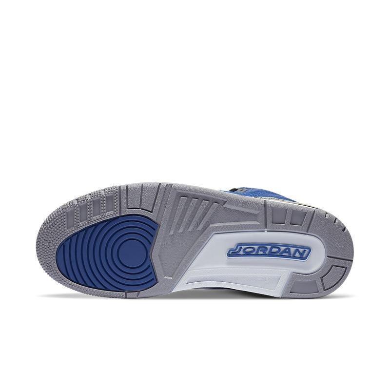 Close-up of a Jordan Air Jordan 3 Retro 'Varsity Royal Cement' sneaker sole with gray and blue design on a white background
