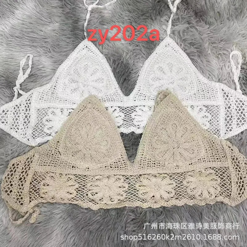 Two lace bras on a gray textured background with 'zy202a' branding.
