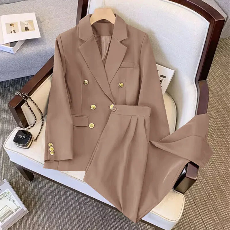 Brown suit jacket and pants on a chair with a hanger