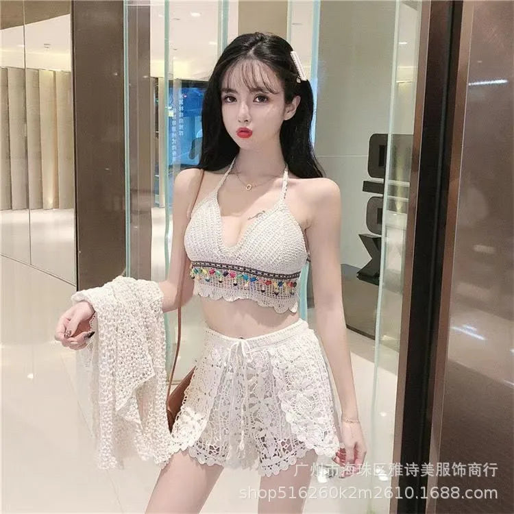 Woman wearing a white lace outfit in an indoor setting