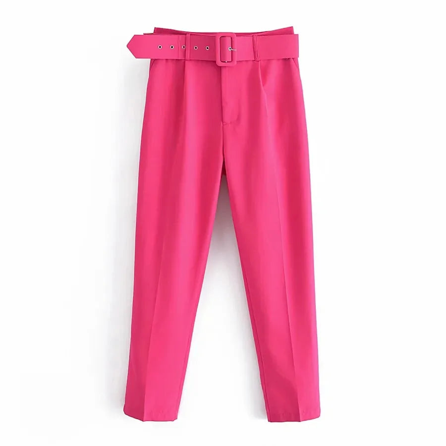 Bright pink pants with a belt on a white background