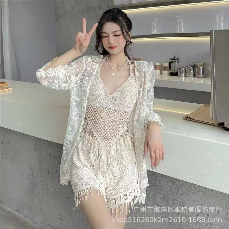 Woman wearing a lace outfit in a modern kitchen setting