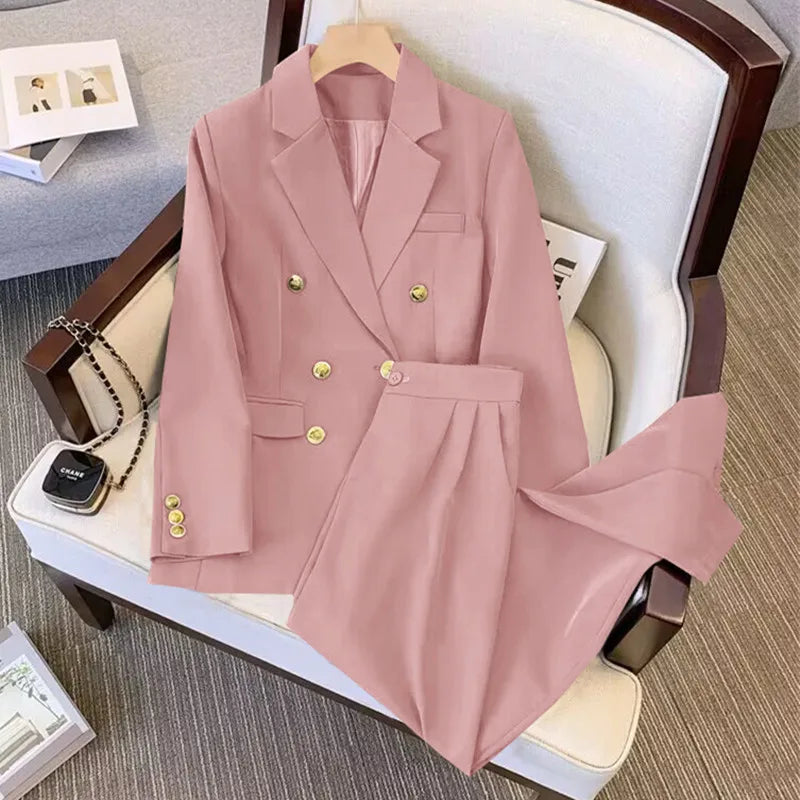 Pink suit jacket and pants on a chair with a hanger