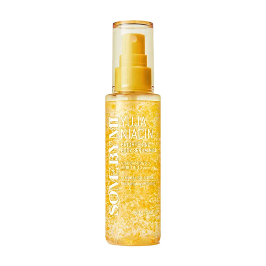 A bottle of Som by Mi Yuja Niacin Brightening Skin Serum, featuring a clear bottle filled with golden-yellow sparkling liquid and a matching yellow pump dispenser, set against a light gray background.